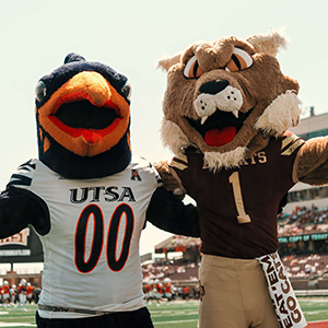 Boko the Bobcat and Rowdy the Roadrunner at the 2024 Texas State and UTSA football game