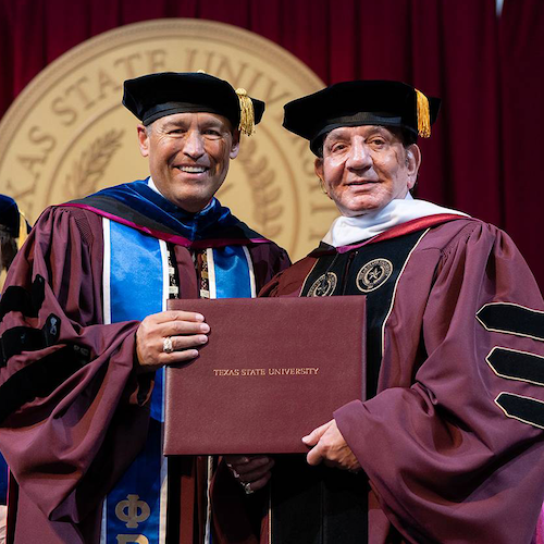 Kelly Damphousse and Richard Castro at commencement with honorary doctorate