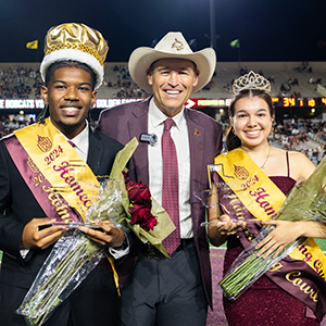 2024 Texas State homecoming king and queen with President Kelly Damphousse