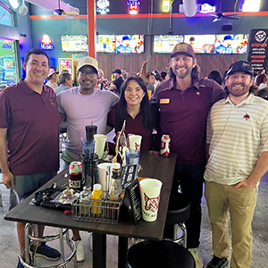 Group of five Bobcat fans at a watch party